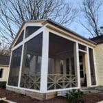 Take a look at this one, folks—a custom screen porch with a shiplap pine ceiling, custom crown molding, and open windows to take in the view. It’s got that timeless New Hampshire charm, just like those old lakeside cottages you see in places like Lake Winnipesaukee. The craftsmanship here? Just as solid as the granite cliffs in Franconia Notch, where people have been taking in the sights for generations. With the vaulted ceiling and the air flowing through, it’s like being outside, but with a roof over your head. Perfect for those warm summer nights when the bugs are buzzing, but you want to stay comfortable and enjoy the view of the White Mountains or your own backyard.