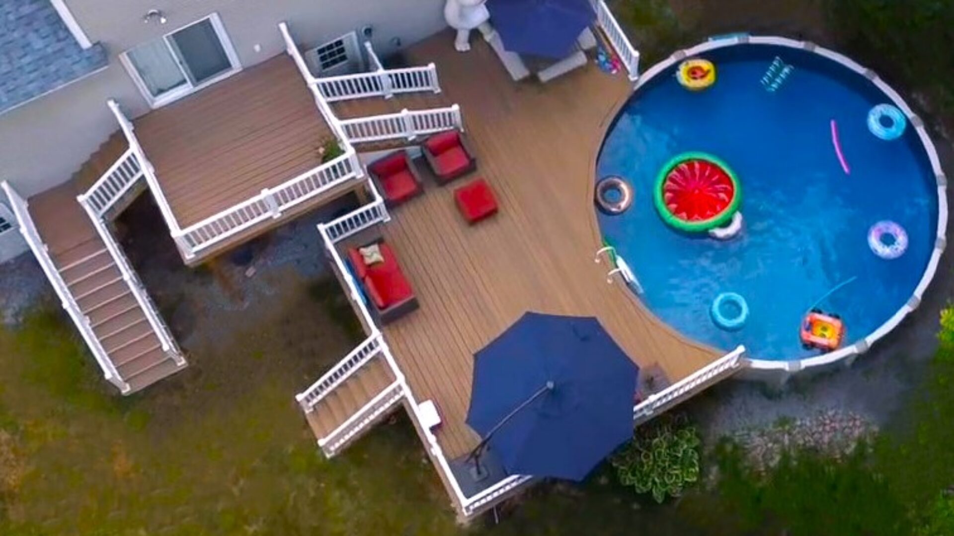Here’s a real beauty for you, folks—a multi-level pool deck that’s got everything you need for a summer of fun. With the decking that’s built to last and Trex RainEscape underneath, you won’t have to worry about a thing. This deck’s got all the bells and whistles: custom storage, gates, and a design that wraps around the pool just like the old stagecoaches used to roll down Main Street in Concord—smooth, reliable, and built to last. Whether you’re hosting a pool party or just taking in the New Hampshire sun, this deck is the perfect place to relax and unwind, just like the folks in Portsmouth did back in the 1700s when they first started gathering along the riverbanks to cool off. It’s got that same timeless feel, with all the modern conveniences you could ask for.